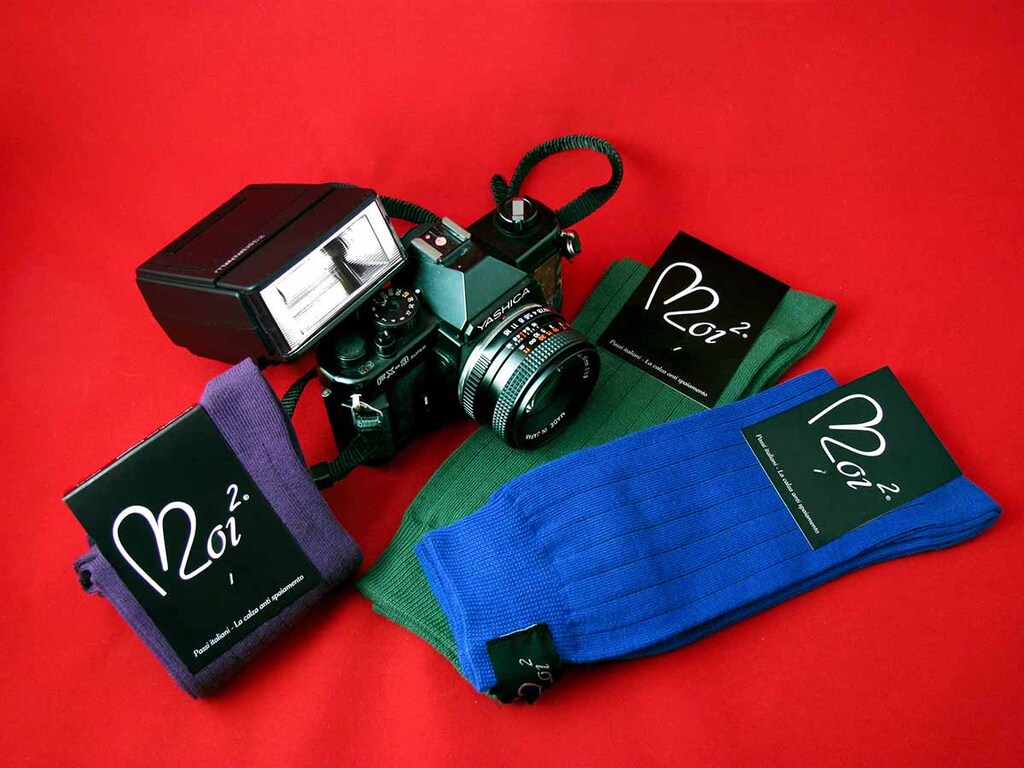 Calze Noi2-antispaiamento-uomo-viola-verde-blu-macchina fotografica-flash